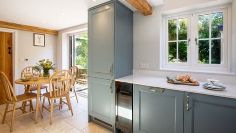 With bi-fold doors that open to the garden you can expand the space and take drinks out to the garden