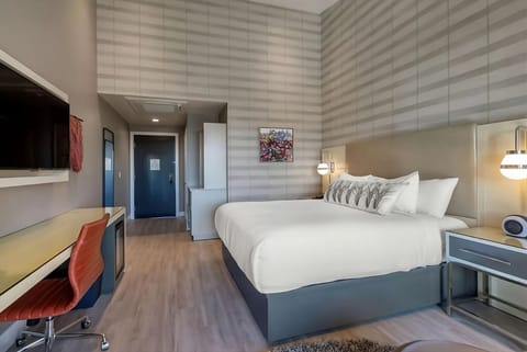 Recharge in a quiet room with sleek floors and soft lighting.