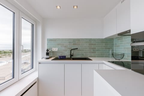 Bright Kitchen with Sea View Window
