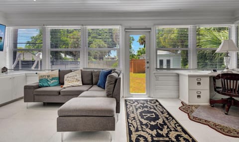 The "Florida Room" is sunny, spacious and receives a wonderful amount of natural light.