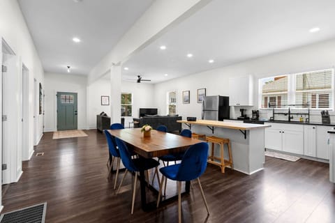 Step inside our modern comfort home featuring high ceilings, open living floor plan to enjoy time with friends and family over dinner, games, or a movie