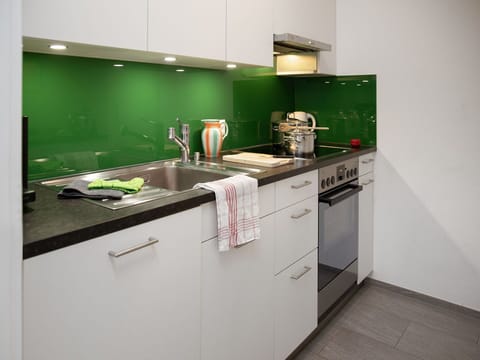 Kitchen, Countertop, Kitchen Appliance, Interior Design, Flooring, Kitchen Sink, Major Appliance, Plumbing Fixture, Tap, Sink