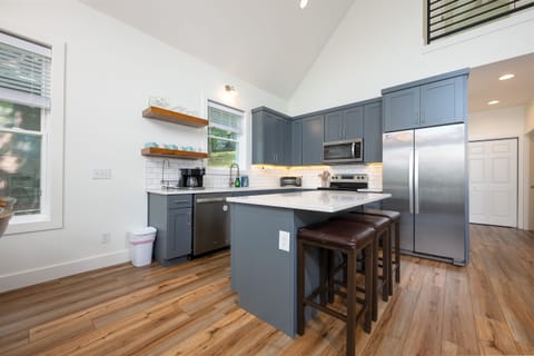 Kitchen-Cooking basics, stainless steel appliances, kitchen island for 3, coffee maker