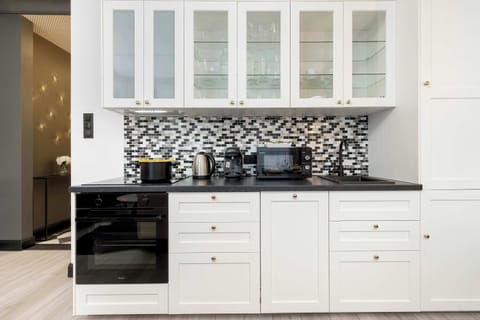 The kitchenette's practical layout maximizes space and functionality.