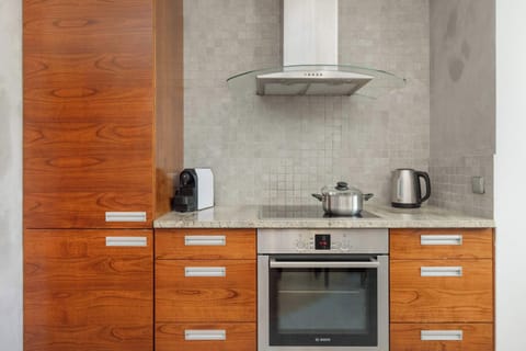 A kitchenette that provides a space ideal for cooking. 

