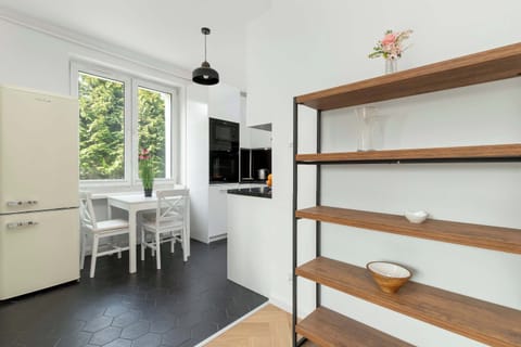 The kitchenette and dining table will allow you to both prepare and eat meals together.