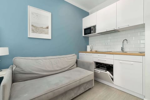 Another angle of the same compact, well-organized kitchen setup.