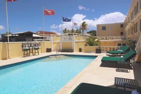 Gather poolside for breezy afternoons and relaxed chats.