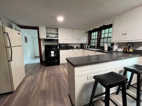 Spacious kitchen with eating bar