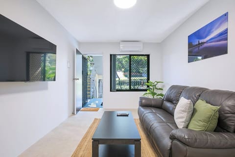 Kick back on the leather sofa and catch your favourite shows on the TV, all in the cool comfort of the air-conditioned living area—an ideal space to relax after a day of exploring Brisbane.