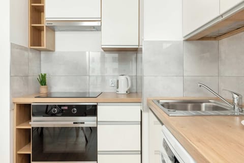 The fully equipped kitchenette includes everything you need for a home-cooked meal.