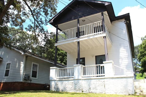 Home features great outside spaces. Porch and Balcony on front of the home and another Balcony on the backside of the home.