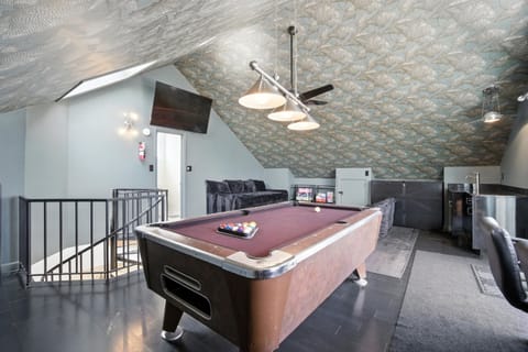The top level Game Room has a full-size Billiards Table with a Bar area