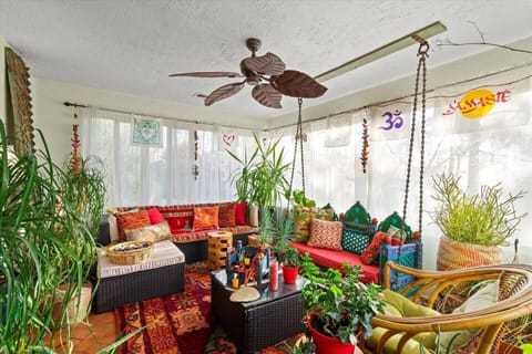 Spacious sunroom with beautiful live plants 