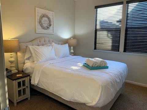 Bed is made with triple sheet method with duvet.