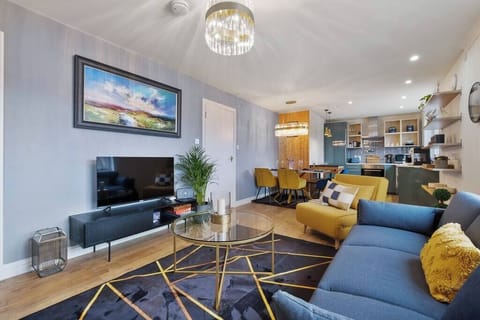 Open plan living area with opulent feature lightings and comfortable sofa beds.
HD Tv with Netflix