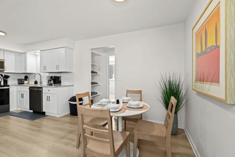 Cozy dining space and open kitchen layout—great for enjoying a meal or hosting friends.