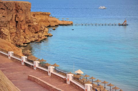 Wander along calm coves and crystal-clear shoreline paths.