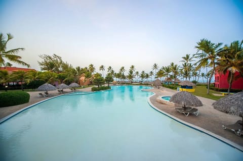 Float along the long, calm pool with resort views.