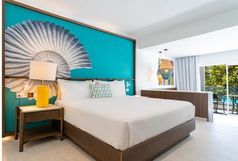 Wake up to sunshine and step out to breezy balcony views.