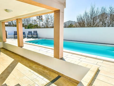 Swimming Pool, Flooring, Floor, Composite Material, Resort, Tile, Concrete, Shade, Eco Hotel, Water Feature