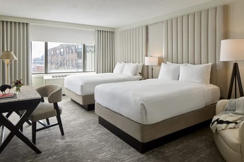 Settle into two cloud-soft beds for effortless rest.