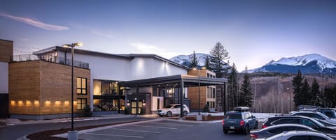 Arrive to modern mountain luxury with glowing evening curb appeal.
