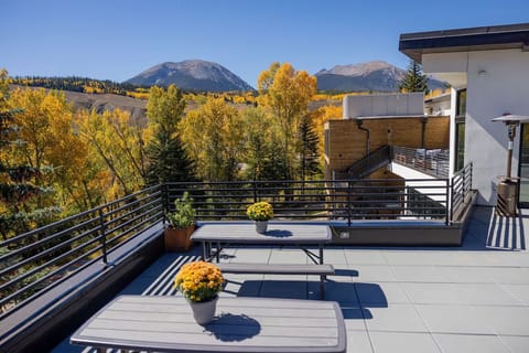 Breathe in crisp mountain air on a sunny private terrace.