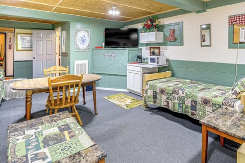 Living Area | 4 Twin Beds | 2 Sleeper Sofas | Free WiFi | Central & Window A/C