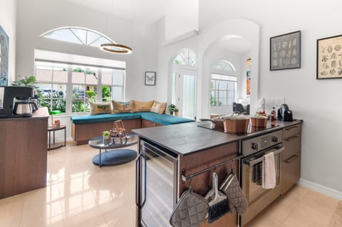 - Enjoy open-concept living with sleek kitchen and lounge   - Modern finishes, natural lighting, and family-friendly feel   - Airbnb home combining design, function, and warm energy