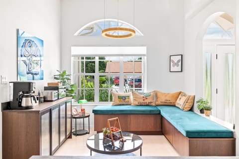 Relax in this light-filled living area w/ an open, airy feel.