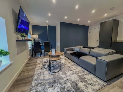Living Room With Sofa and Smart TV