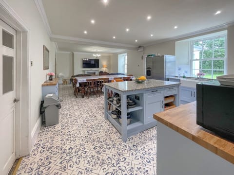 The huge kitchen dining room it&rsquo;s light and dairy and overlooks the garden | Hafod Grove - Hafod Grove and Fach, Moylegrove, near Ceibwr Bay