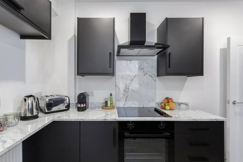 Modern, fully equipped kitchen with everything you need – including coffee fix essentials.