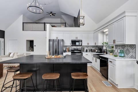 Fully loaded chef's kitchen with brand new Samsung Black Stainless appliances.