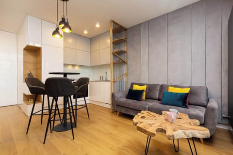 Living room with a comfortable sofa and TV. 