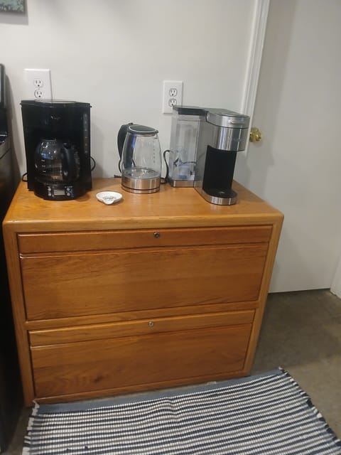 In the coffee bar, the top drawer provides all the essentials. 