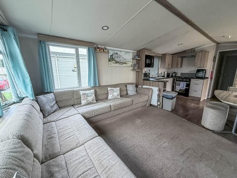 Cozy living room with panoramic windows and plush seating
