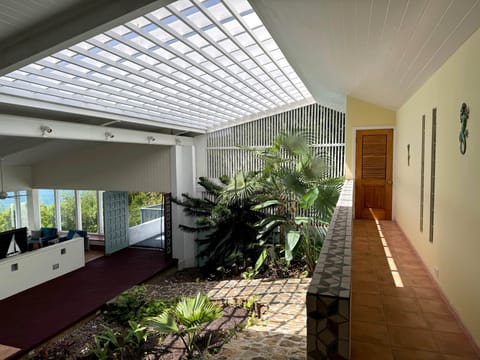 01 - Attrium - Main House Photo