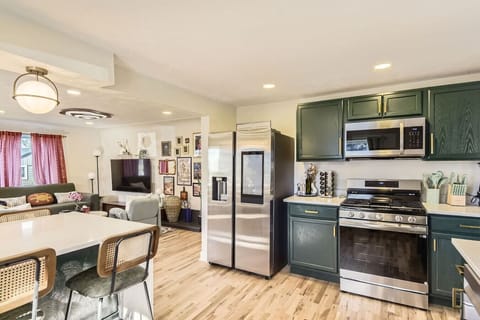 House 1: Modern, updated kitchen with eat-in bar top