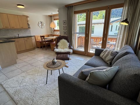 Furniture, Flooring, Wood, Interior Design, Floor, Couch, Living Room, Apartment, Room