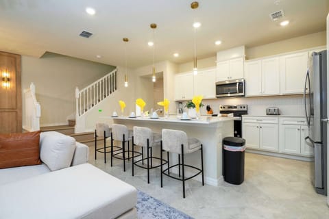 Enjoy an open layout with plenty of seating and a breakfast bar-ideal for sharing meals and making memories together!