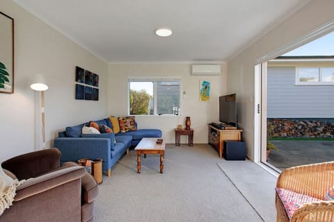 There is air-conditioning in the living room that will keep you warm in Winter and cool in Summer.