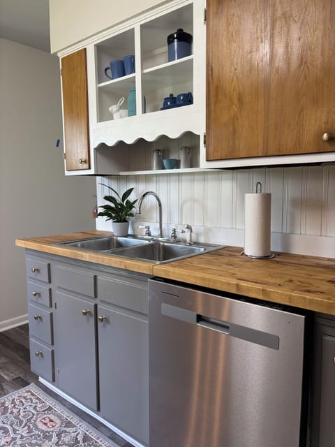 Alternate view of kitchen sink with natural light