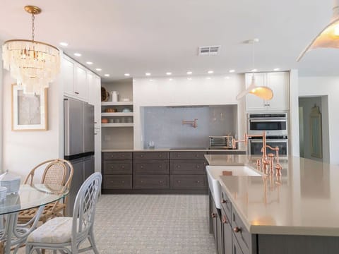 Kitchen - Dine at the bar or at the table that seats 4