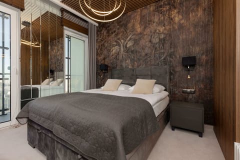 Living area with double bed.