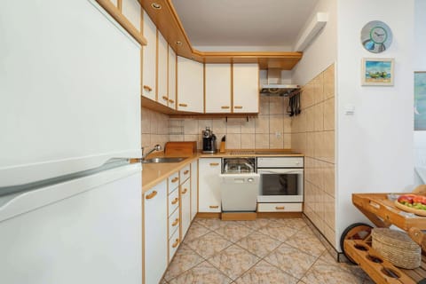 The kitchen is equipped with the necessary items to make delicious food, as well as enjoy a good cup of coffee.