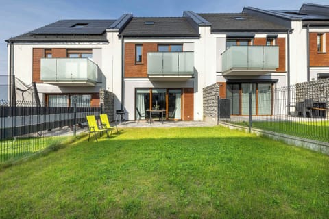 A modern development with a private garden offers peace and plenty of space to relax outdoors.