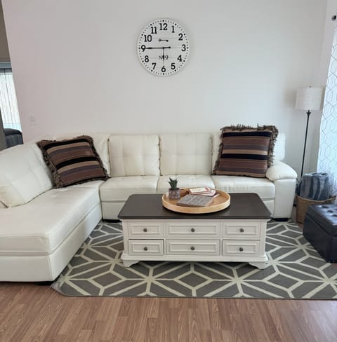 Comfortable living room with lots of seating.