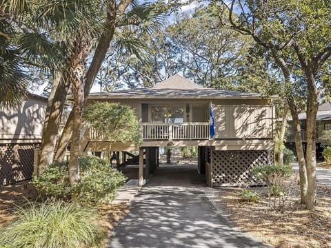 Enjoy this oasis nestled among majestic oak trees on captivating Kiawah Island!
